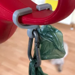 Dog poop bag carrying clip