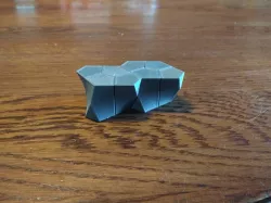 Pentagonal Scutoid that Tiles with Itself