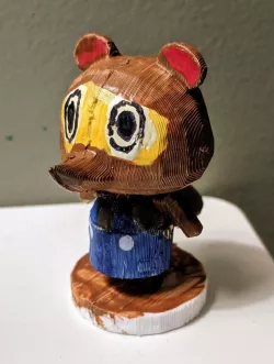 Timmy or Tommy-like figurine
