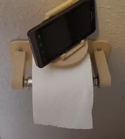 Toilet paper holder with rotating phone rest