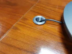 Cable guide for table hole
