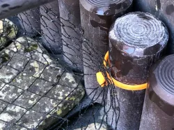 Net hook for plastic border surround