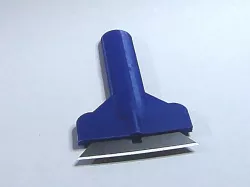 Utility blade bed scraper