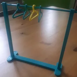 Doll clothes hanger