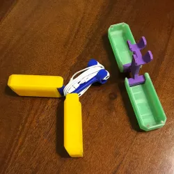 Apple earbud holder