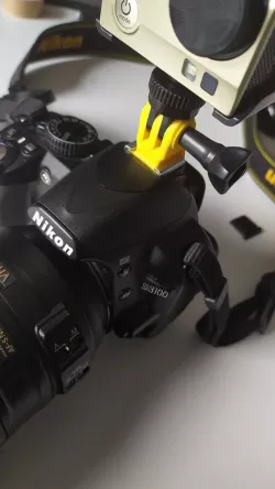 Cam support for Nikon flash slide