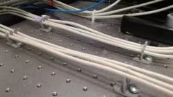 Air-table cable holder