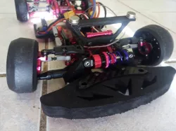 Sakura D4 single front shock mod