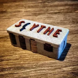 Scythe coin box magnetic clousure