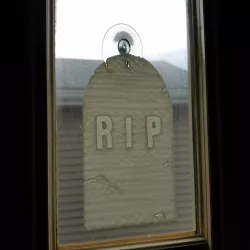 Tombstone window hanger