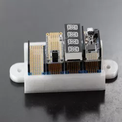 An 8020 series 10 FeatherWing quad Mini bumper mount
