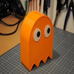 Pac-Man Ghost piggy bank with separate eyes