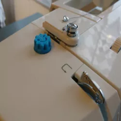 Sewing maching easy foot tension knob