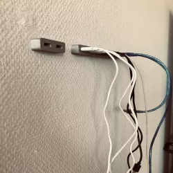 OpenSCAD USB cable storage for wall mount