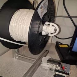 Quick release expanding spool holder