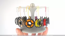 Mini filament spool and earring carousel stand