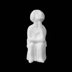 Figure of a seated old woman at The British Museum, London