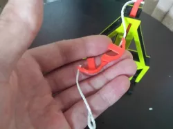 Floating arm trebuchet (dimes and pennies)