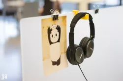 Headphone holder for office desk divider