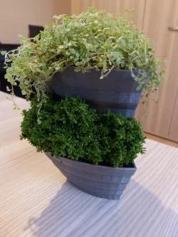 Small stackable planter for creating vertical garden