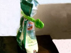 Bag closer with spoon