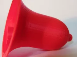 Bell with integral clapper