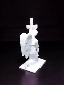 Gravestone Depicting Angel Holding the Cross