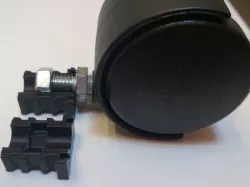 Castering wheel foot enclosure plug