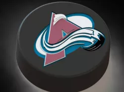 Colorado Avalanche logo on ice hockey puck