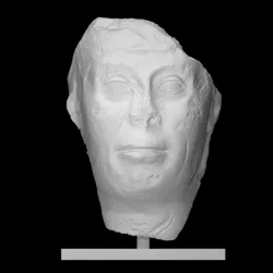 Head from a Statue with Magical Texts