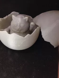Japanese lucky cat in a surpise egg