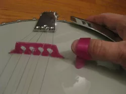 5 string banjo bridge and thumb pick