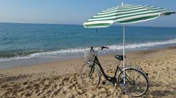 Bike accessory for a beach umbrella