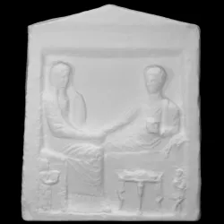 Gravestone figuring a farewell scene