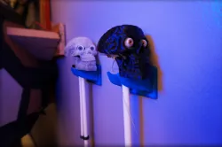 Hang many things, including wide shavers, wall hook