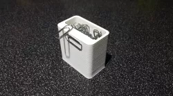 Paper clip box with magnet