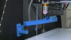 Servo driven nozzle wiper arm.