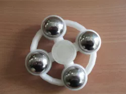 Fidget spinner with balls