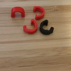 Bicycle brake cable holder clips