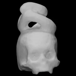 Snake sitting on a skull (netsuke)