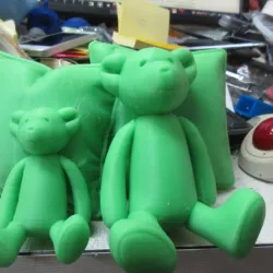 Toy bear figure with pillows