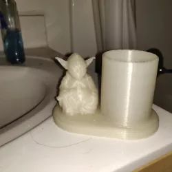 Yoda buddha pen stand