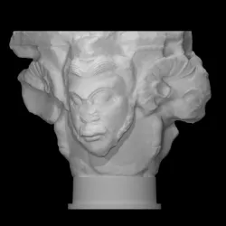 Capital with heads of men and animals