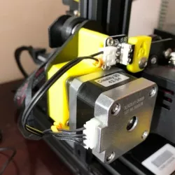 Ender 3 X-axis stepper motor damper mount for press-fit pulleys