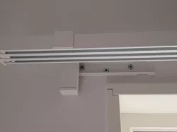 Curtain rail adapter