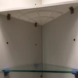 Locking medicine cabinet shelves