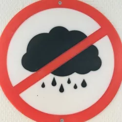 Funny sign - No Raining clouds