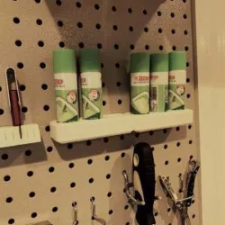 Pegboard holder for glue sticks