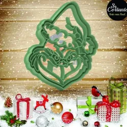 CUTTER OF COOKIES MERRY CHRISTMAS