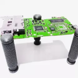 Magnetic spring loaded PCB holder